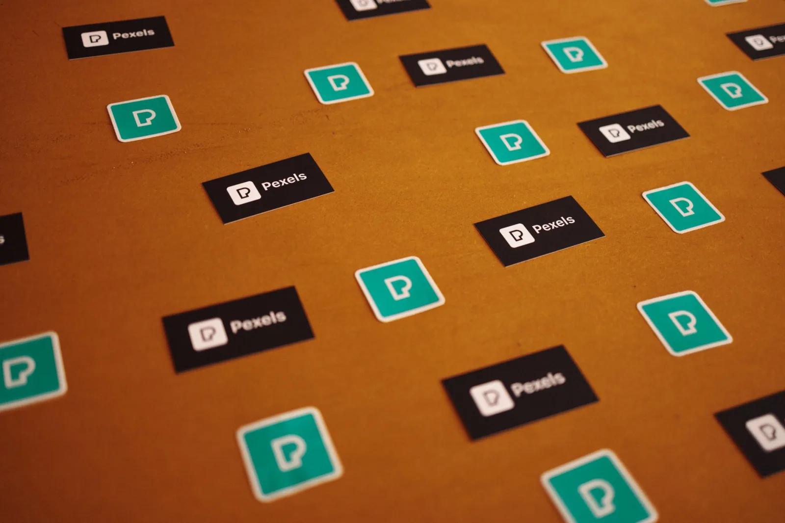 Professional hero image illustrating logo design for Irish startups with geometric brand marks and orange accent elements on dark background
