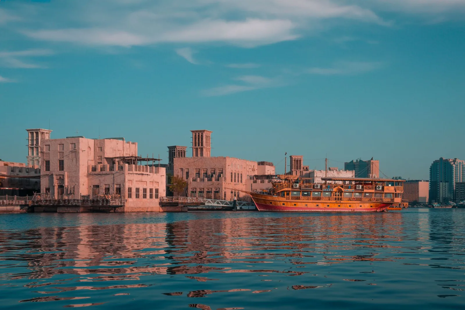 Comparison visualization showing weak versus strong social media copywriting for UAE hospitality brands, illustrating transformation from generic captions to converted booking-focused Instagram copy with orange and navy branding